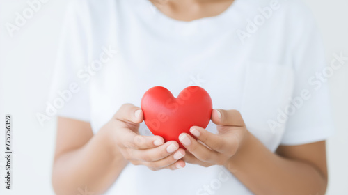 Compassionate nurse presents heart  emphasizing cardiac care  safety life