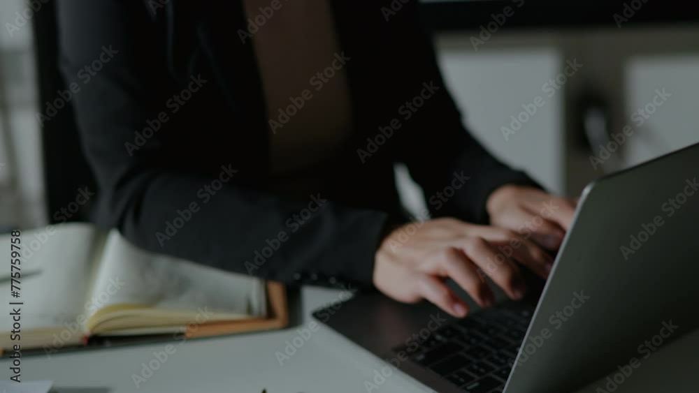 FPV view of professional businesswoman cross her arms confidently after finish typing and working on laptop document and calculator about business accounting financial and marketing FPV view of professional businesswoman cross her arms confidently after finish typing and working on laptop document and calculator about business accounting financial and marketing