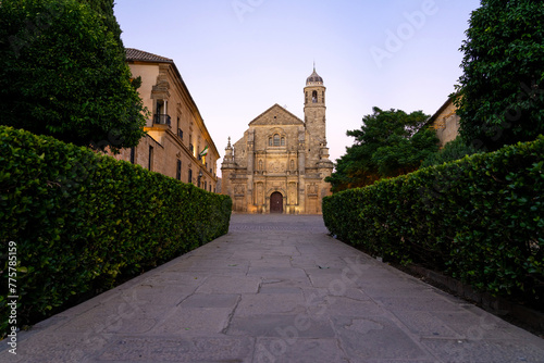 San Salvador church at night in Vazquez de Molina square in the old town of the Renaissance city of Ubeda, World Heritage Site by UNESCO. Jaen, Andalucia, Spain. photo