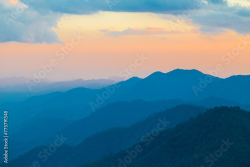 Sunset on the top of mountain tropical forest colourful sky cloud