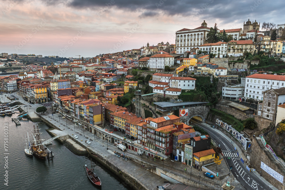 View from Dom Luis I Bridge over Douro River in Porto with Bishops Palace, Portugal