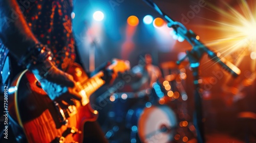 Vibrant live concert scene with guitarist on stage, dramatic lighting, and bokeh effect creating atmospheric music event. Music performance and entertainment.