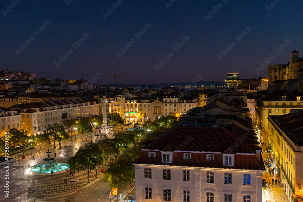 View of king pedro IV square called rossio at night in Lisbon Portugal 