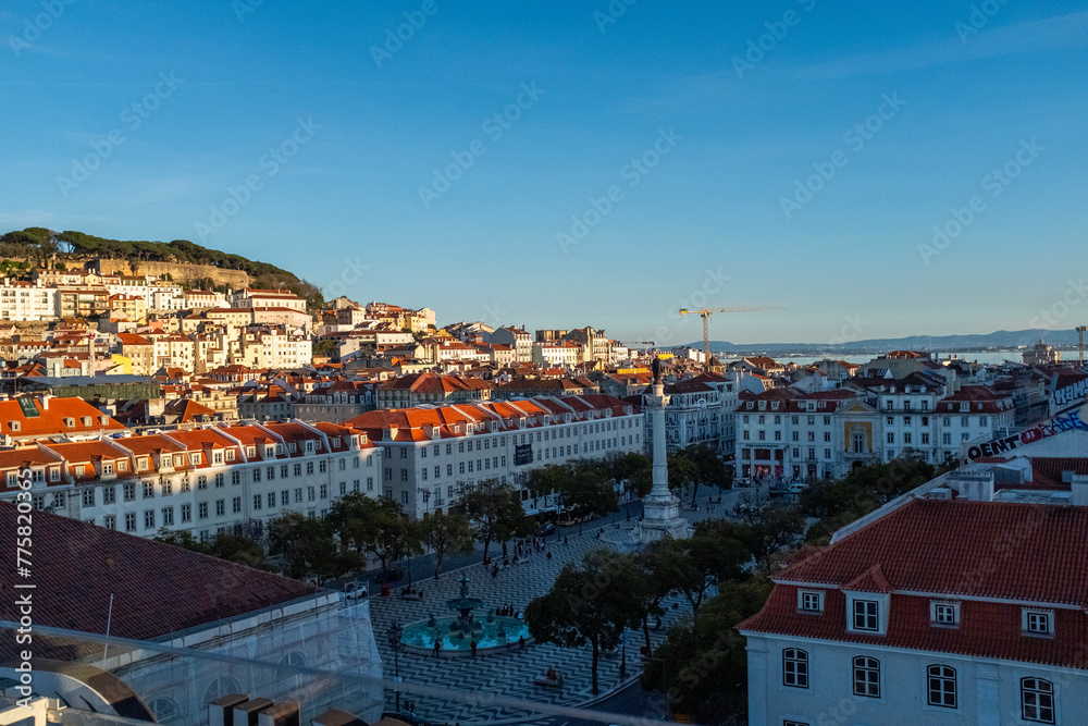 View of king pedro IV square called rossio from above at dusk in Lisbon Portugal
