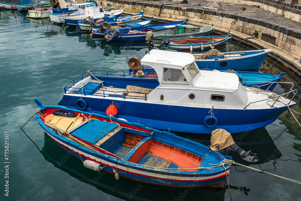 Fishing boats in port of Syracuse city, Sicily, Italy Fishing boats in port of Syracuse city, Sicily, Italy
