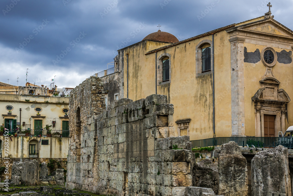 Remains of Greek Temple of Apollo and Saint Paul the Apostle church, Ortygia island, Syracuse city, Sicily Island, Italy