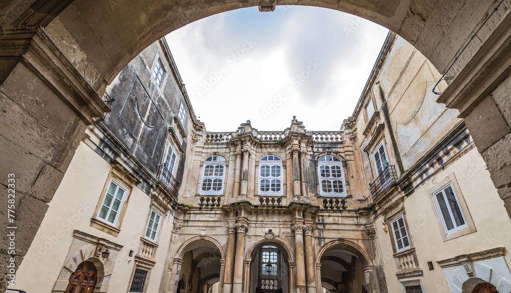 Courtyard of Beneventano del Bosco building on Cathedral Square on Ortygia island, old part of Syracuse, Sicily, Italy