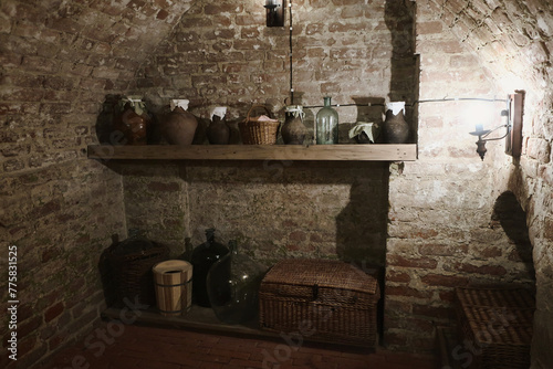 Old pantry with materials, foods and containers from long ago. Larder in the old farmhouse