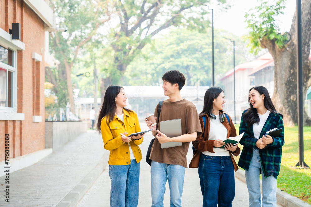 Obraz premium Diverse group of young adults from Asia and beyond, enjoying university life together. happy, learning, and making lifelong friendships, whether in outside class, sunny summer days or cozy weekends