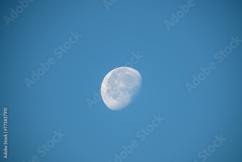 The Moon in daytime in a blue sky has something beautiful