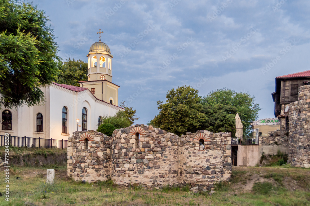 ST. Cyril and Methodius Cathedral in Sozopol, Bulgaria. Rear view with ancient ruins of St. Nicola church.