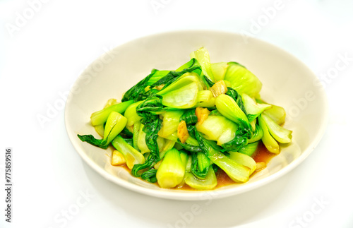 Vegetable food menu, stir-fried Bok Choy vegetable with oyster sauce without meat. Close-up food image on white background.