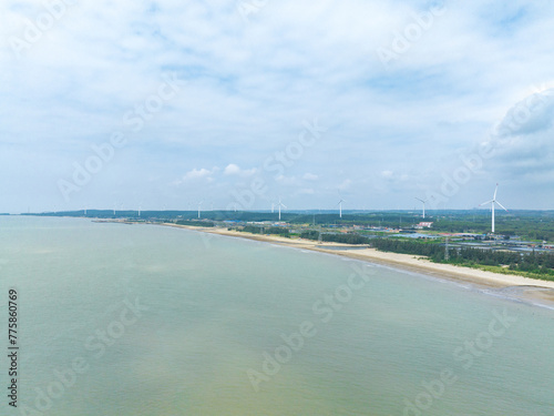 Fototapeta Naklejka Na Ścianę i Meble -  Wind power plant on the Baltic Sea coast in Zhanjiang, Guangdong, China