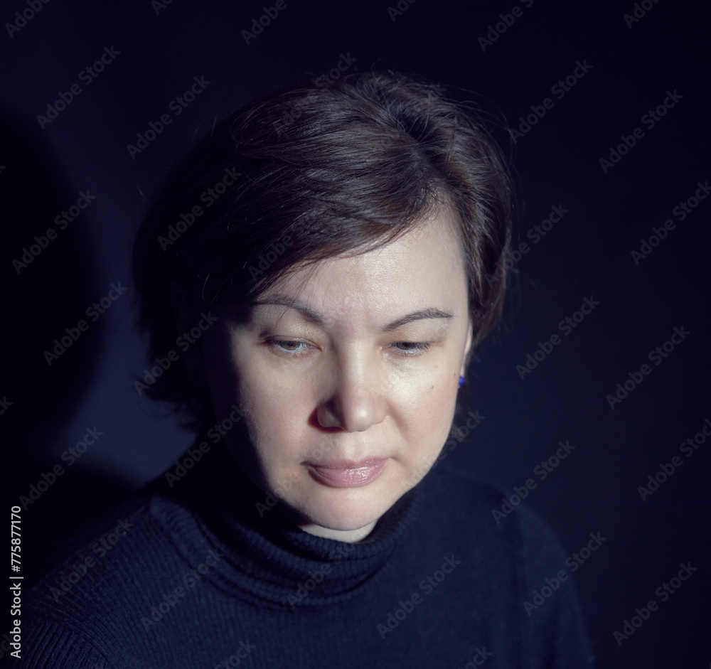 mature woman portrait in short light mature woman portrait in short light