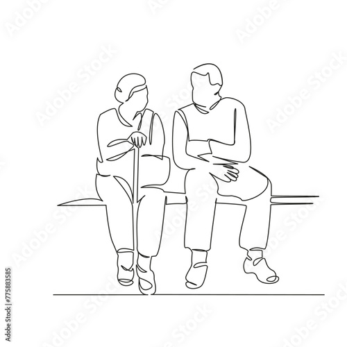 elderly couple sitting on a bench