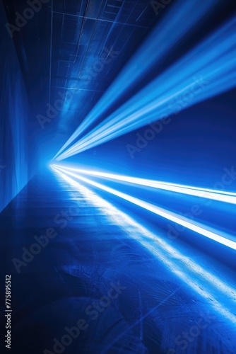 Long exposure photo of blue lights in a dark room. Great for technology or nightlife concepts