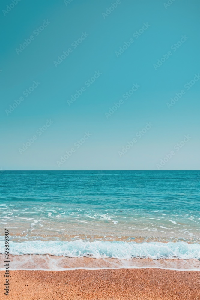 A scenic view of the ocean from a sandy beach, perfect for travel websites or vacation brochures