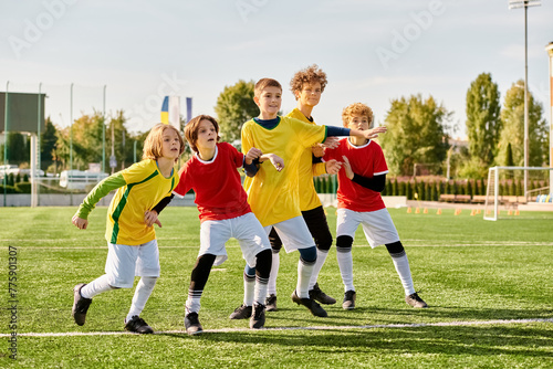 Φωτογραφία A lively group of children is playing a friendly game of soccer