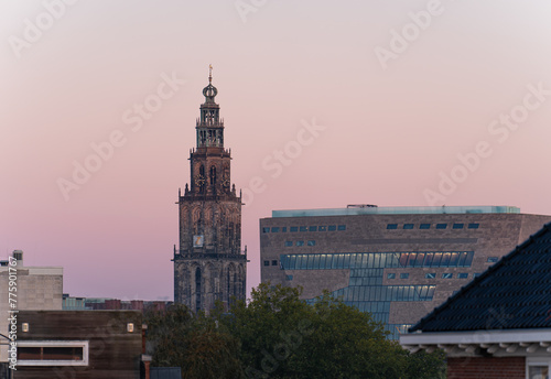 The Martinitoren and teh Forum building on a clear morning in the historical city centre of Groningen. © sanderstock