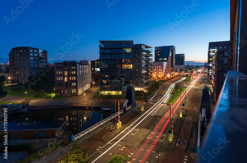 Light trails from traffic in the city of Groningen at dawn. © sanderstock