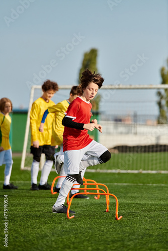 A dynamic group of young children engage in a spirited game of soccer, kicking the ball around the field with enthusiasm and teamwork. 