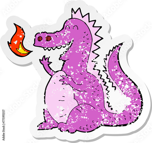 retro distressed sticker of a cartoon fire breathing dragon