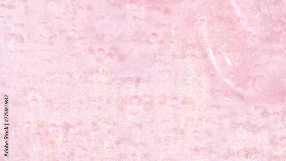 Pink Transparent Cosmetic Gel Fluid With Molecule Bubbles Flowing On The White Surface. Macro Shot. Liquid Cream Gel Transparent Cosmetic Sample Texture With Bubbles. High quality 4k footage Pink Transparent Cosmetic Gel Fluid With Molecule Bubbles Flowing On The White Surface. Macro Shot. Liquid Cream Gel Transparent Cosmetic Sample Texture With Bubbles. High quality 4k footage