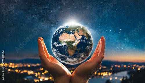 Hands holding earth photo