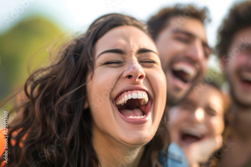 A photo of a group of friends laughing and having fun together
