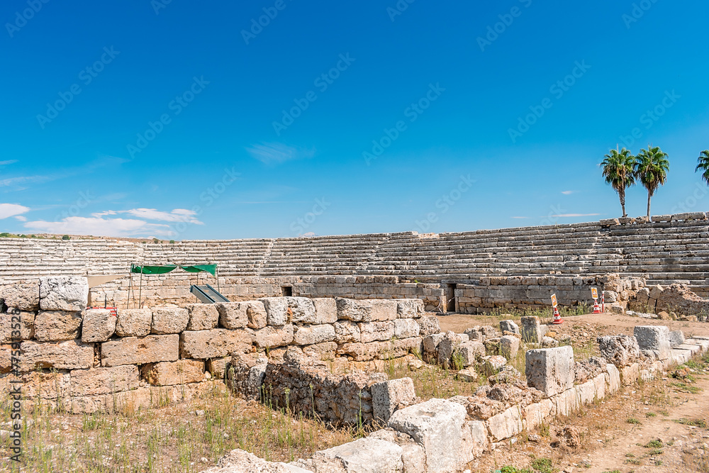 Picturesque ruins of the stadium in the ancient city of Perge. Ruins of the city of Perge in Turkey.