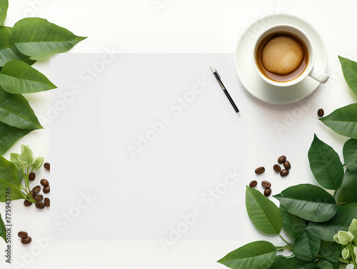 White empty background with a laptop and coffee in the right part of the image and a green leaf in the left part with space for text  inscriptions or graphics. View from above 
