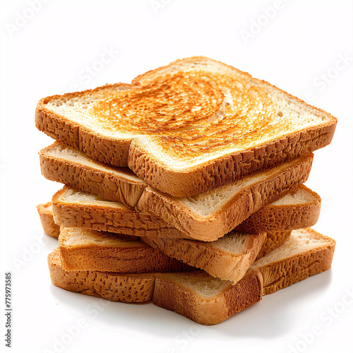 A stack of golden brown toasts on a white background photo