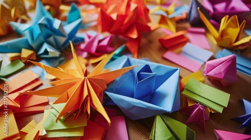 An array of sticky note origami creations, their colors bright against a wooden desktop, showcasing playful creativity and the joy of paper folding no splash