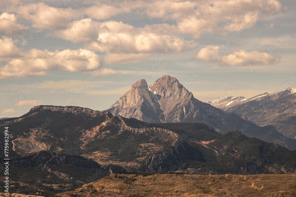 Pedraforca mountain peak with cloudy sky background