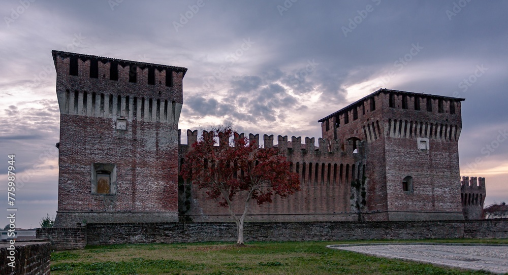 Beautiful shot of the historic Soncino's Castle and grounds at sunset in Italy
