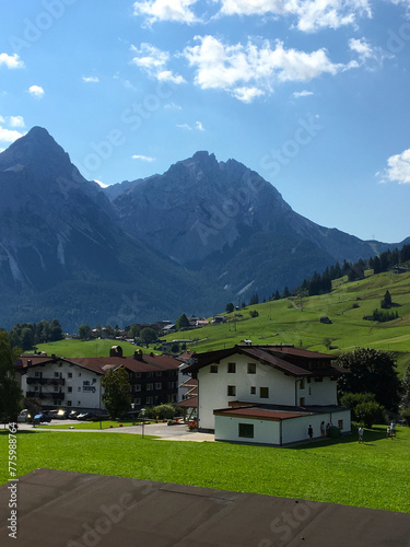 Beautiful photo of a stunning mountain with a village located somewhere in Germany.