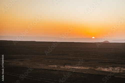 sunset over the Nazca lines in the desert