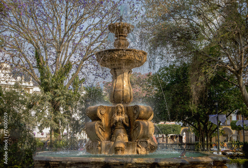 Colonial water fountain in antigua guatemala's park