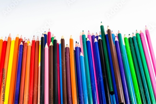 Closeup of colorful wooden pencils isolated on white background
