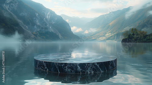 Black round marble display podium, standing in a gorgeous scenic landscape in front of a lake, with mountains in the background. photo