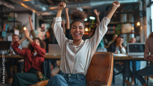 women expressing her joy by uplifting her arms.