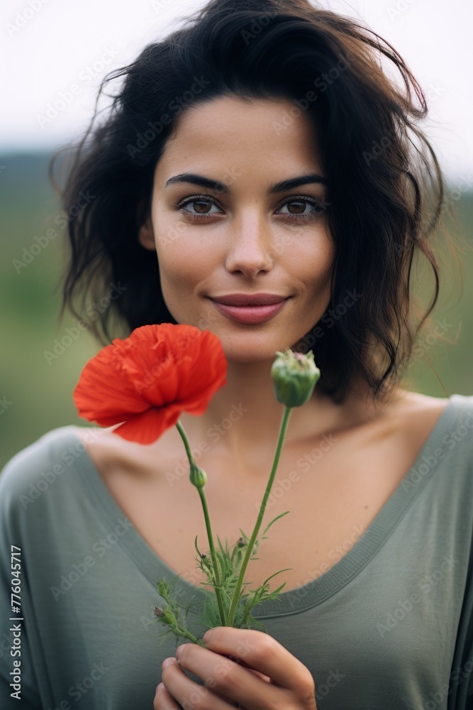 Naklejka premium Portrait of a woman in a poppy field. Vertical photo. Generative AI.