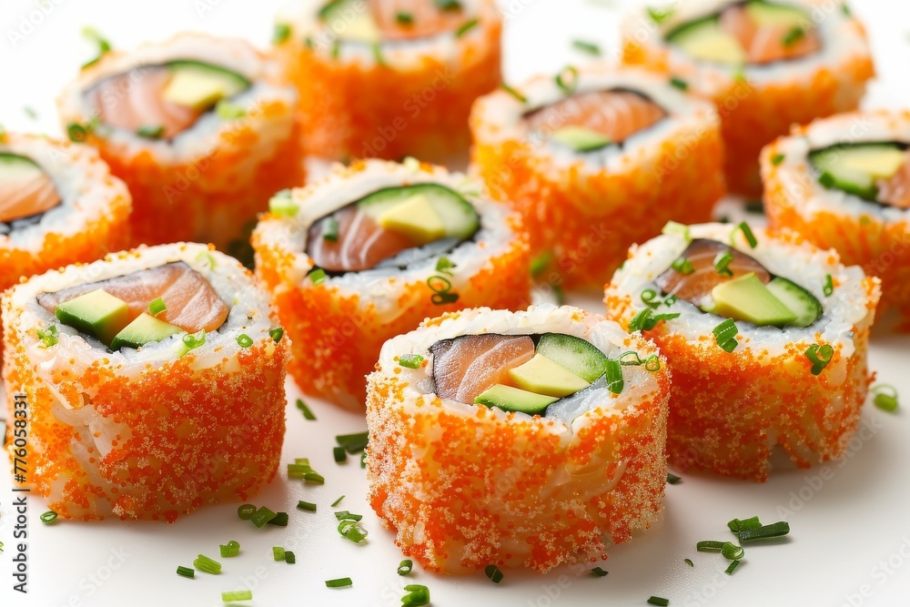 A close-up of sushi rolls with salmon and cucumber, wrapped in seaweed and served with soy sauce.