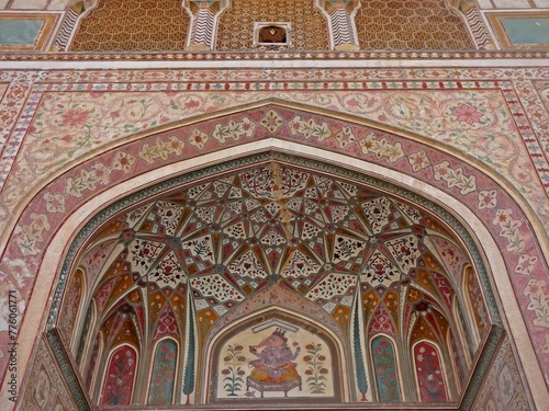 The highly Colorful and intricately painted Ganesh Pol Gate in Amber Fort   Amer Fort   Jaipur  Rajasthan  India 