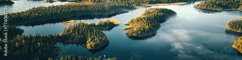 tranquil aerial sunrise over a serene lake surrounded by forests