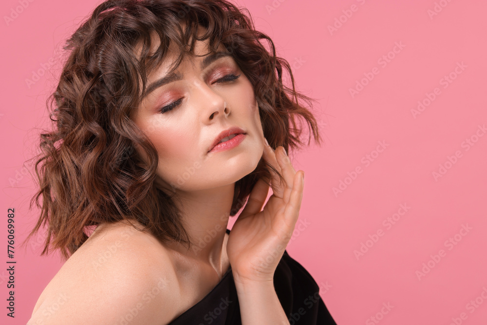 Portrait of beautiful young woman with wavy hairstyle on pink background. Space for text Portrait of beautiful young woman with wavy hairstyle on pink background. Space for text