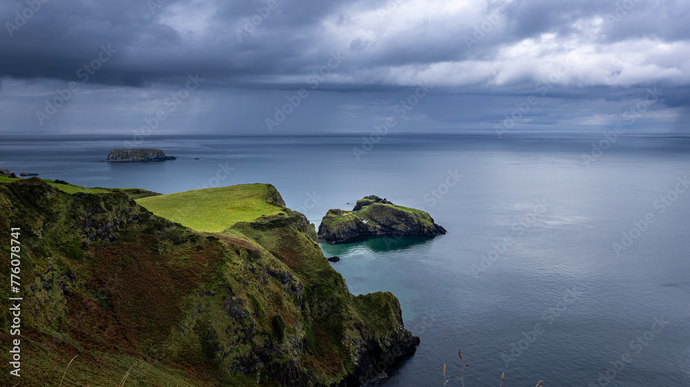 Coast of Northern Ireland, distant view of Carrick-a-Rede Rope Bridge