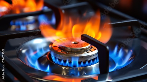 Gas oven - orange tongues of blue flame of a gas burner