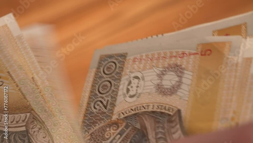counting 200 zł bills. polish PLN currency savings photo