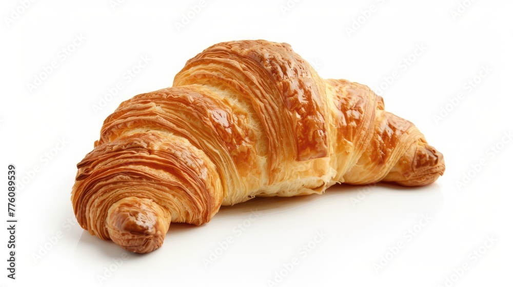 Single tasty crusty croissant close-up croissant on white background
